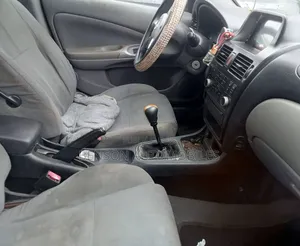 Nissan Almera Tino 2002 Rouge