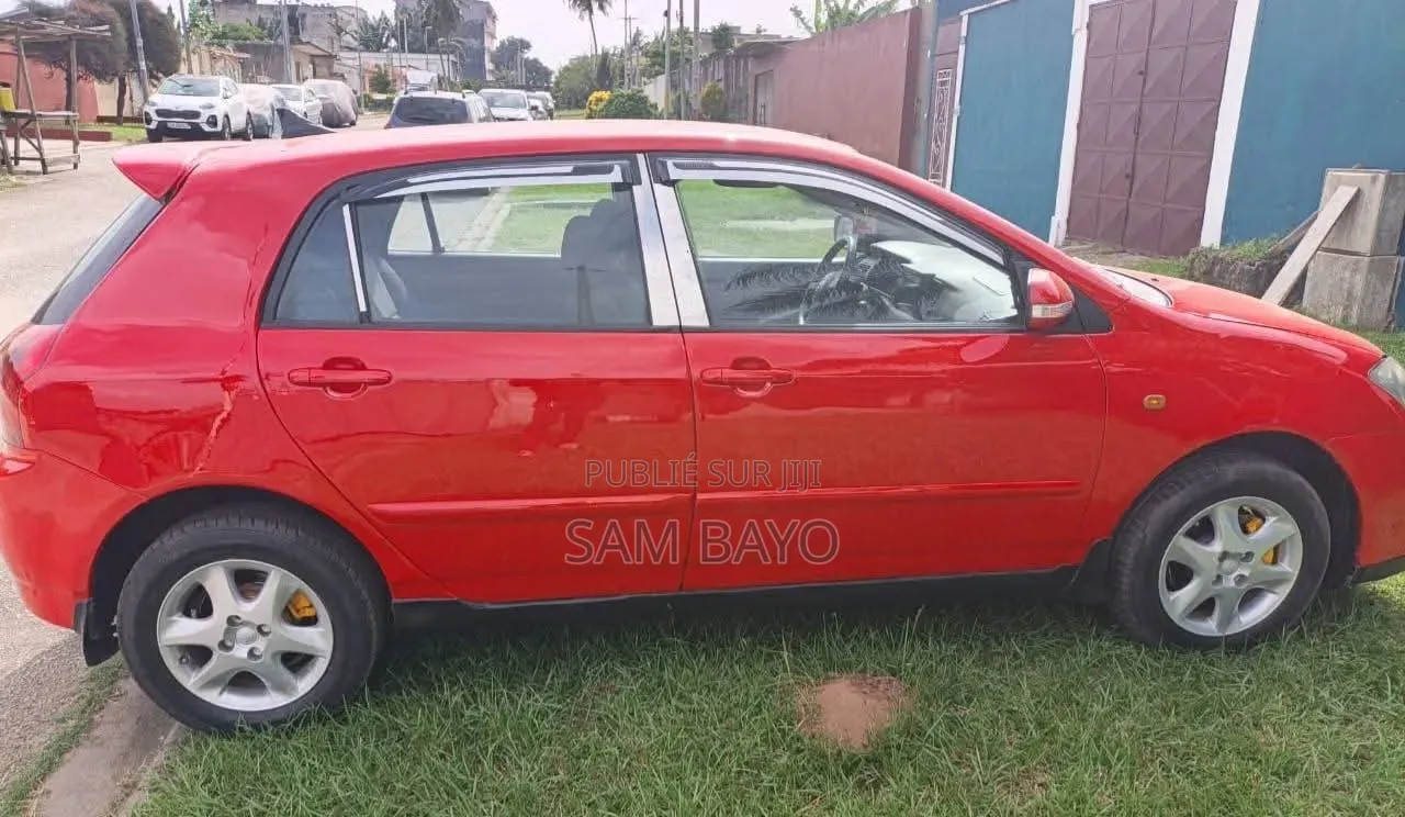 Toyota Corolla 2002 Orange