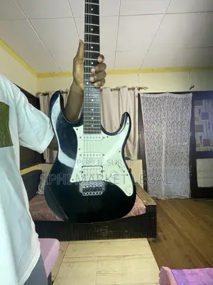Guitare Solo Électrique Moins Chère D’Origine