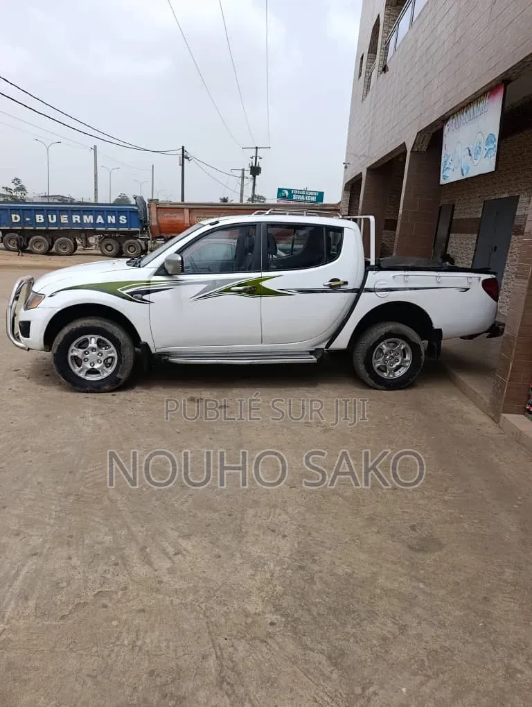 Mitsubishi L200 2010 Blanc