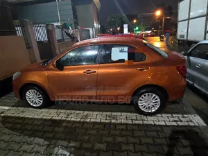 Suzuki Dzire 2023 Orange