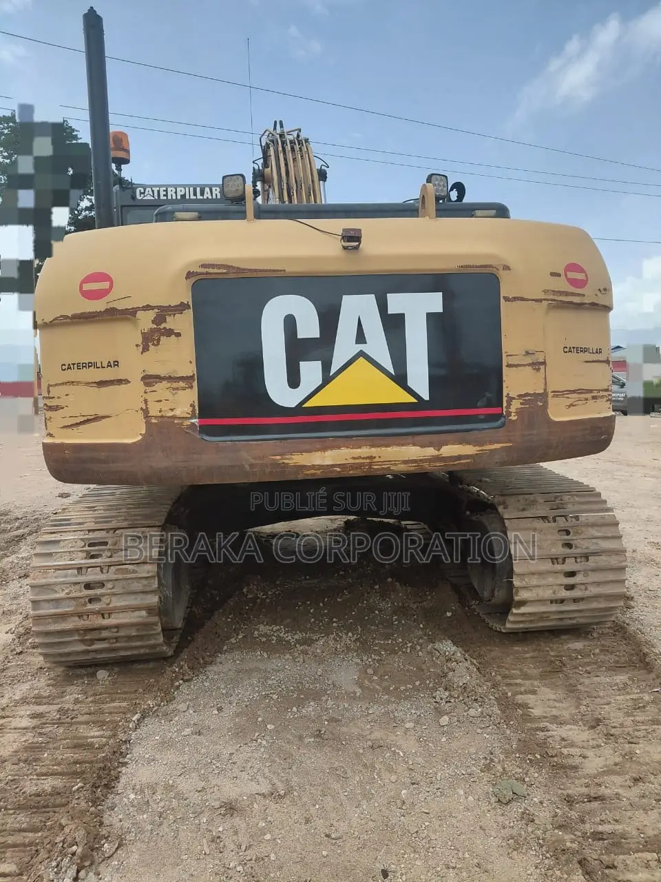 Pelle Cat 323d Importé