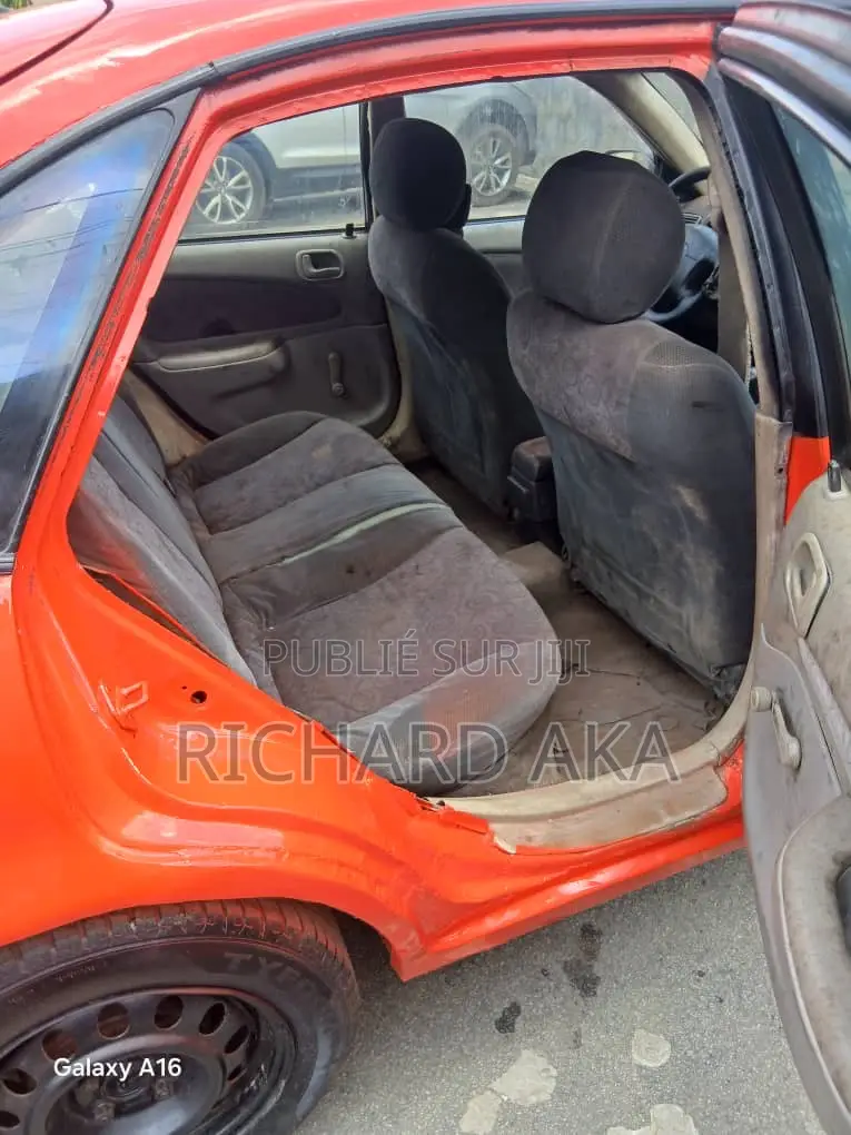 Toyota Corolla 2002 Rouge