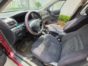 Toyota Corolla 2006 Rouge