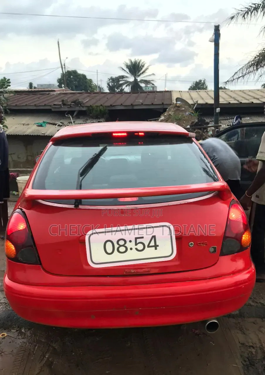 Toyota Corolla 2002 Rouge