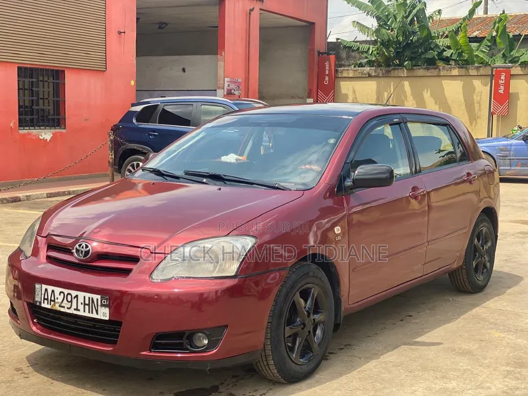 Toyota Corolla 2004 Rouge
