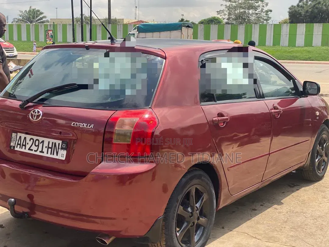 Toyota Corolla 2004 Rouge