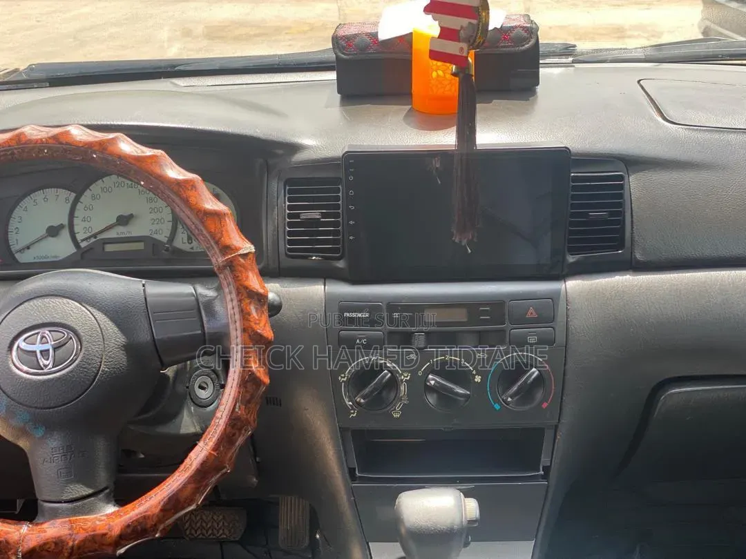 Toyota Corolla 2004 Rouge