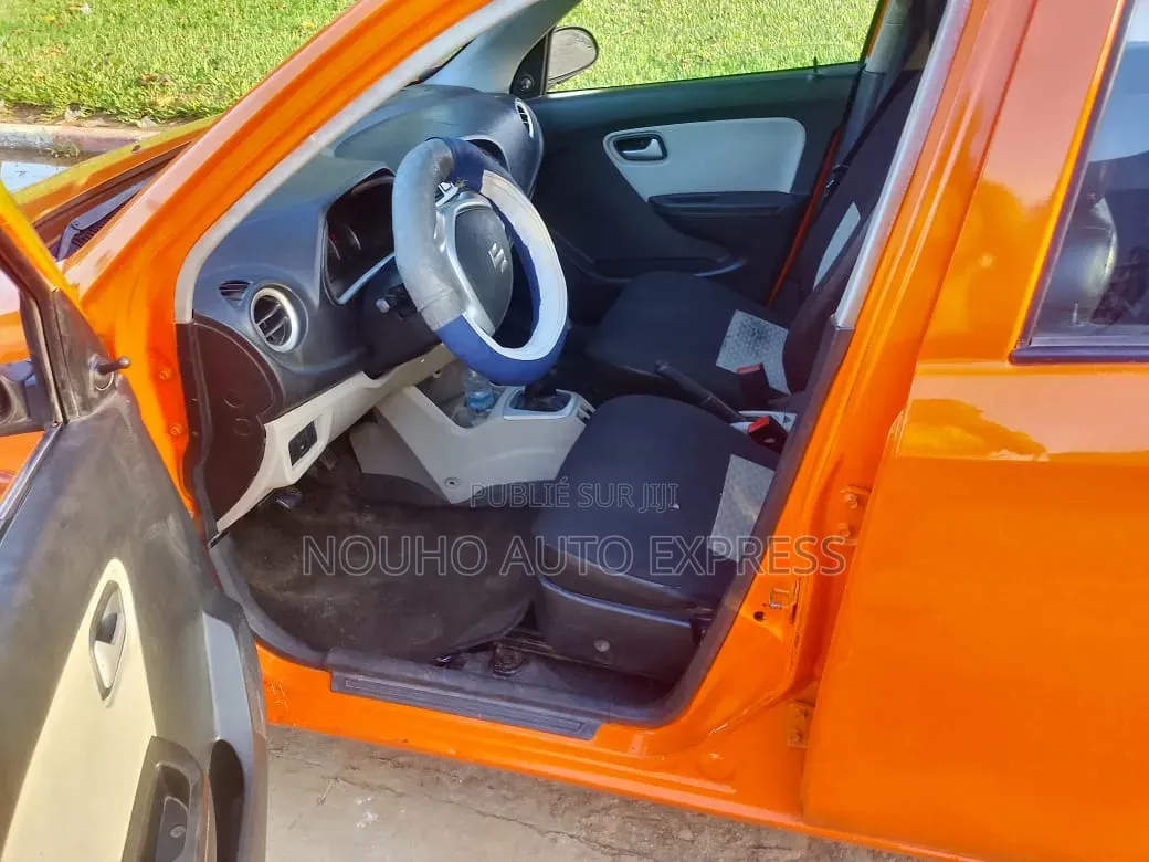 Suzuki Alto 2023 Orange