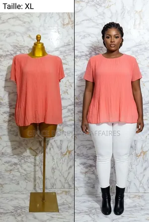 Haut Orange Plissé. SOLDE : 1500FCFA