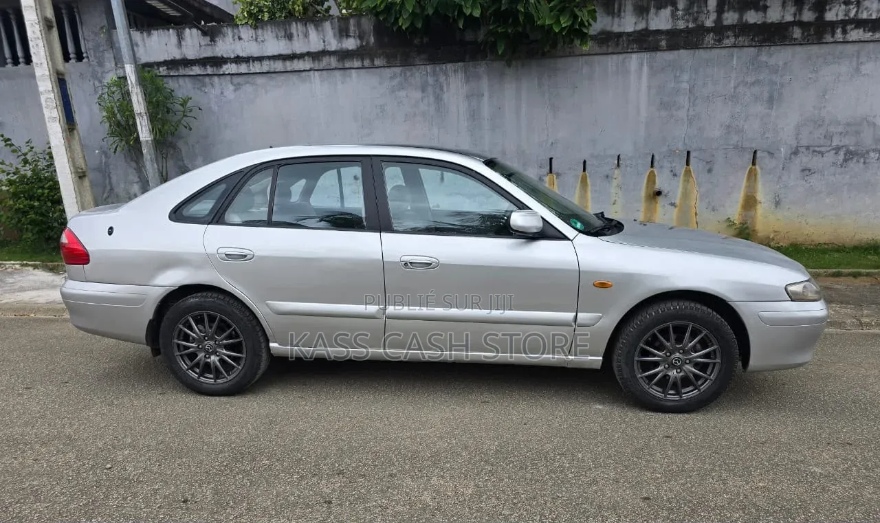 Mazda 616 2002 Gris