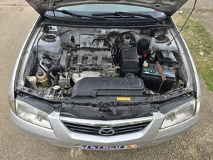 Mazda 616 2002 Gris