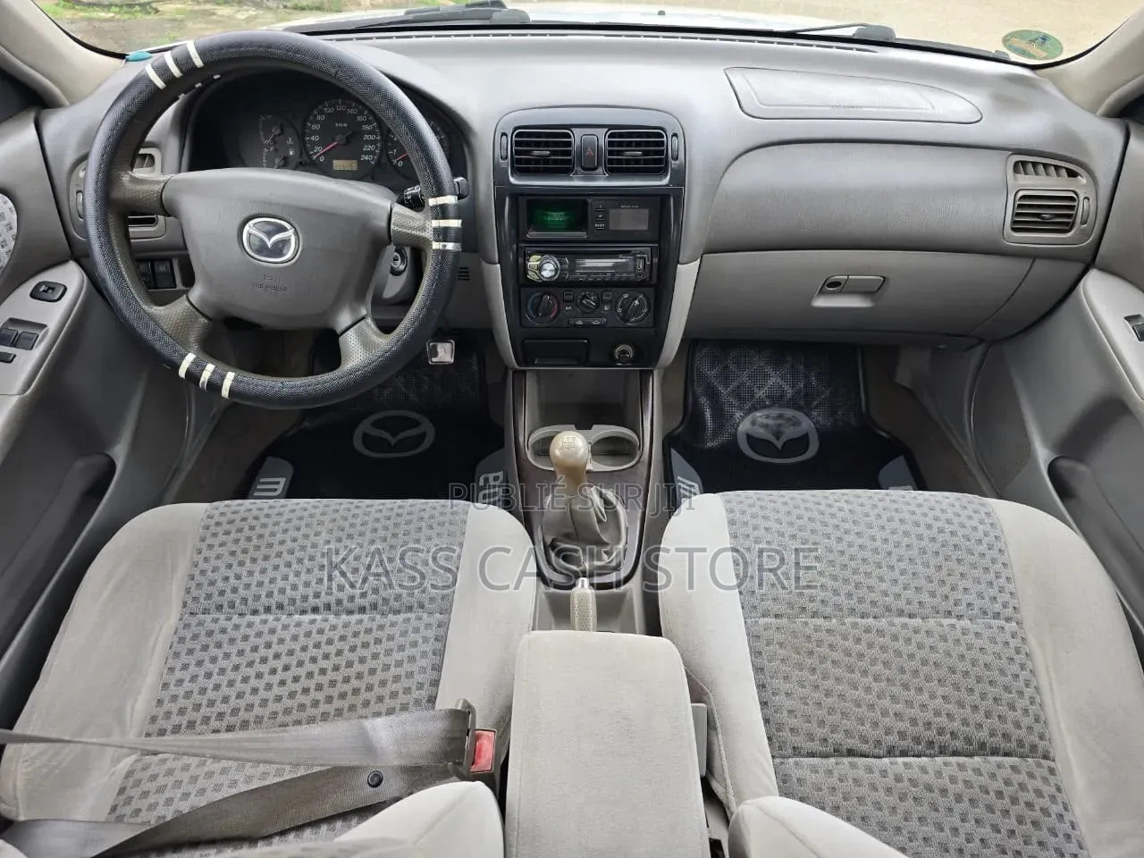 Mazda 616 2002 Gris