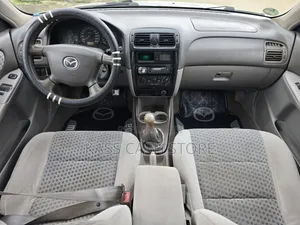 Mazda 616 2002 Gris