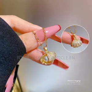 Collier Avec Pendentif en Perle,