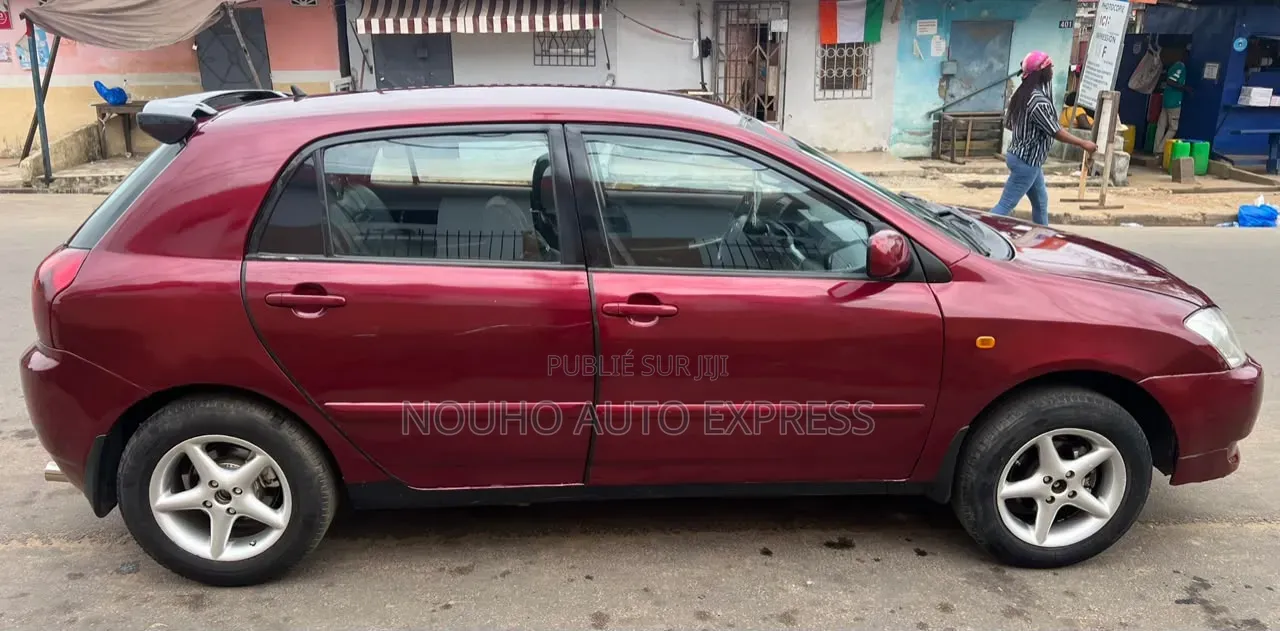 Toyota Corolla 2004 Rouge