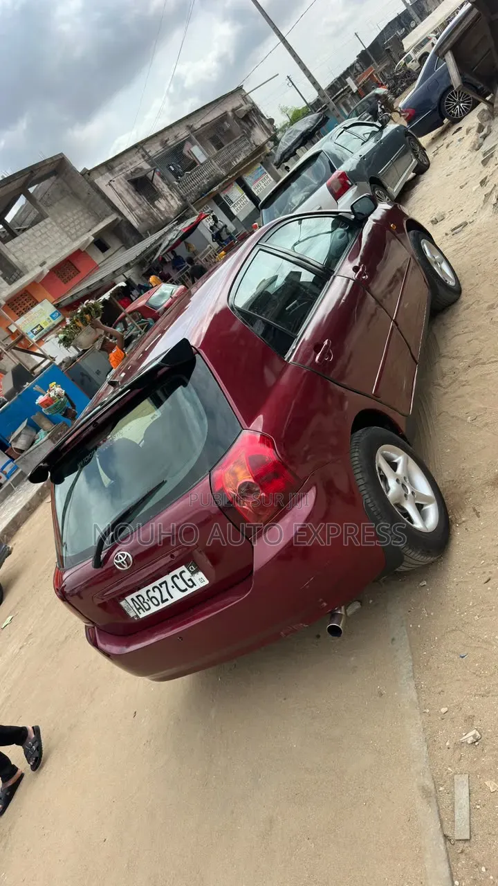 Toyota Corolla 2004 Rouge