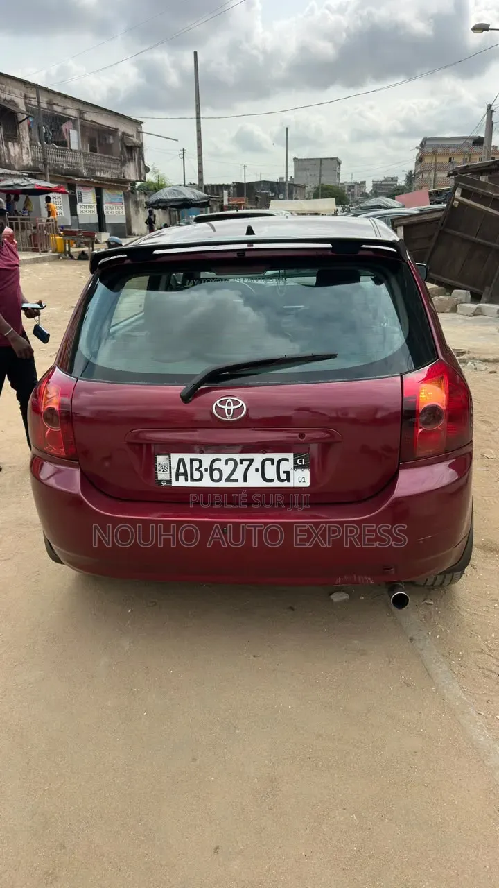 Toyota Corolla 2004 Rouge