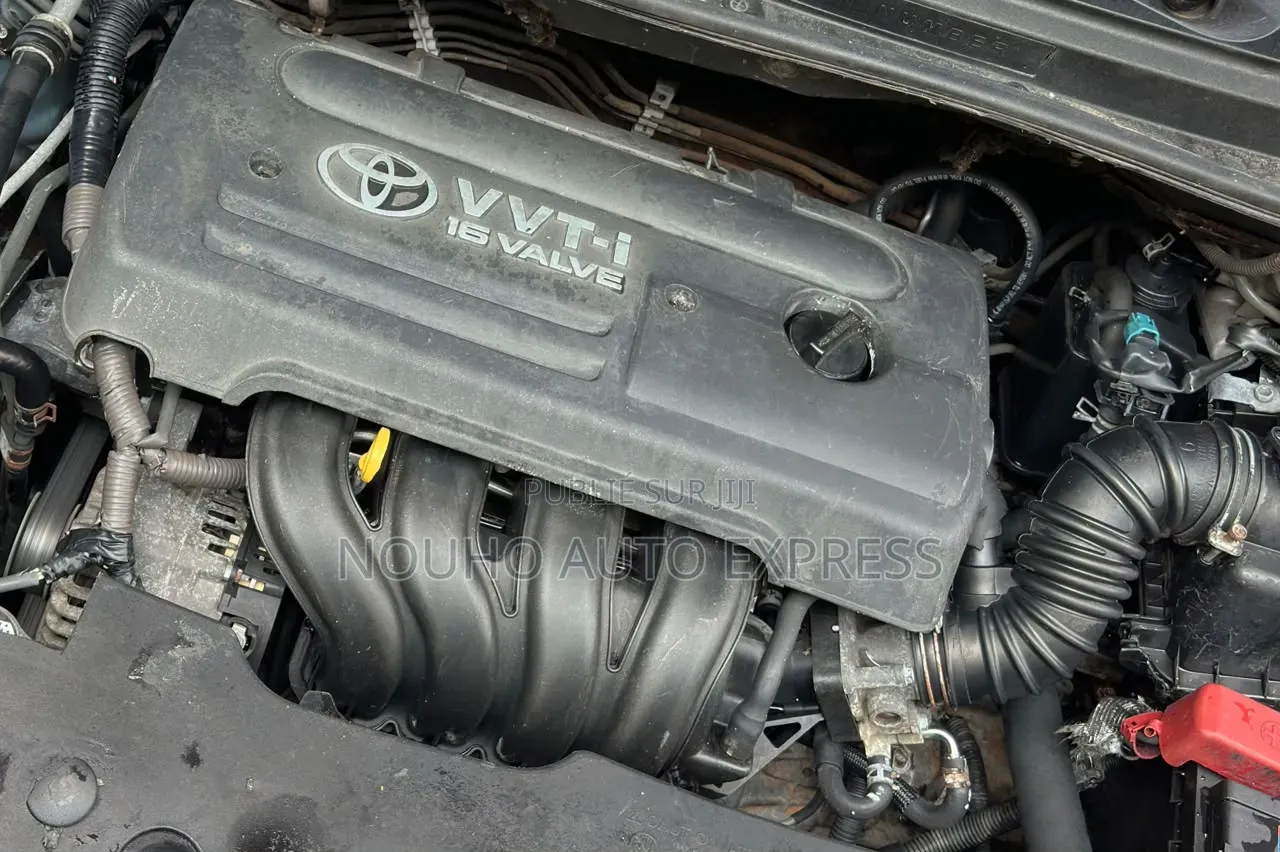 Toyota Corolla 2004 Rouge