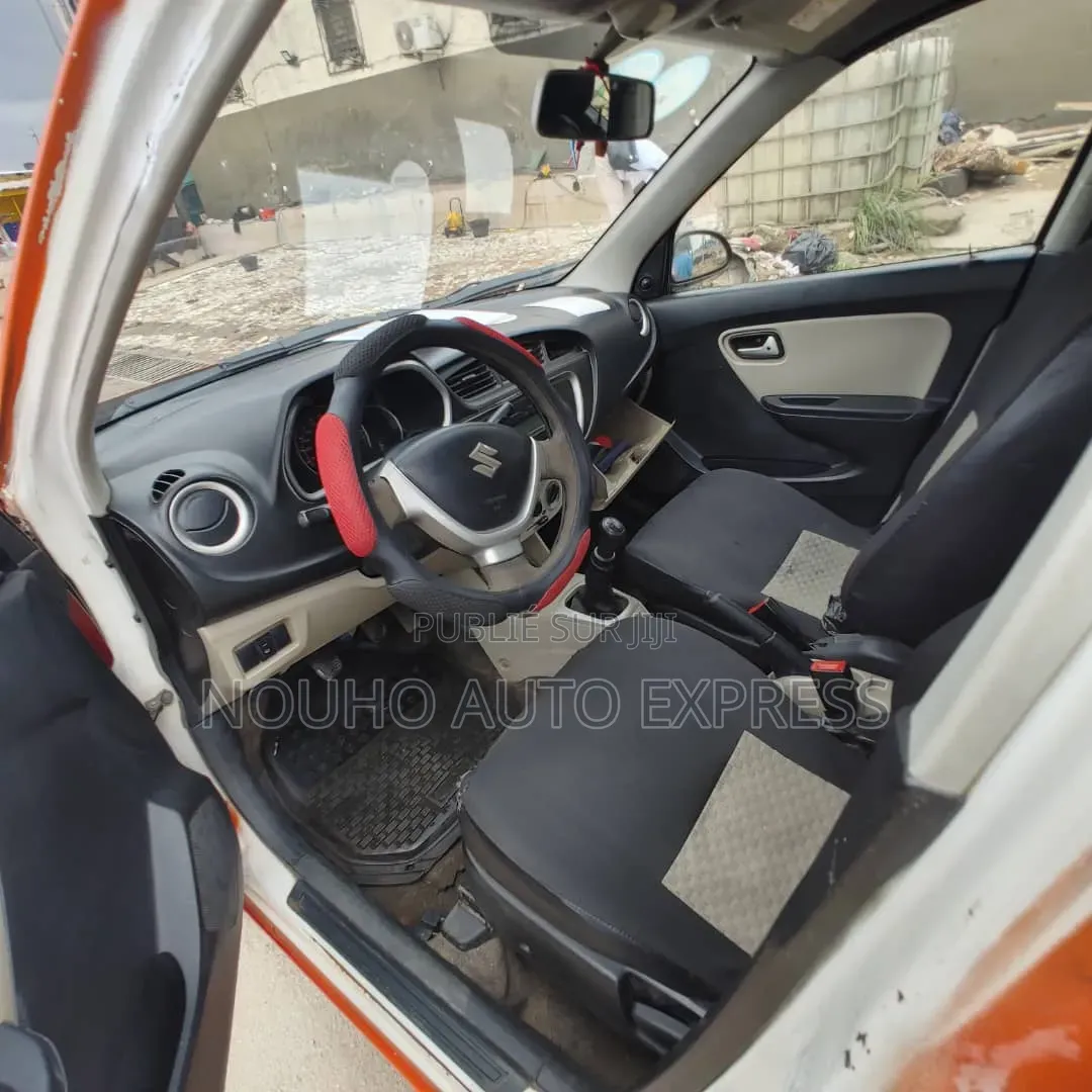 Suzuki Alto 2024 Orange